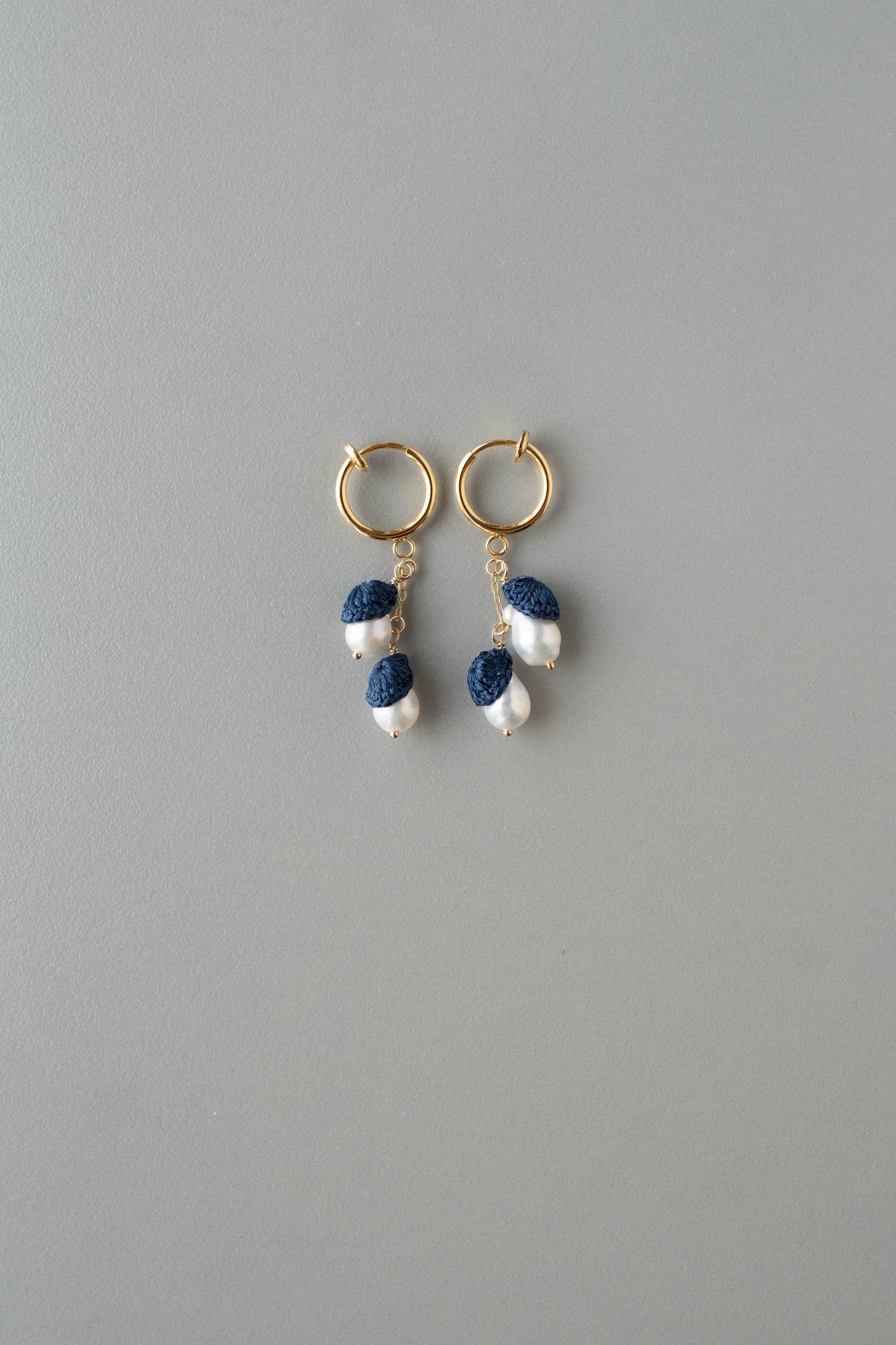 Cuddle pearl earrings | Indigo